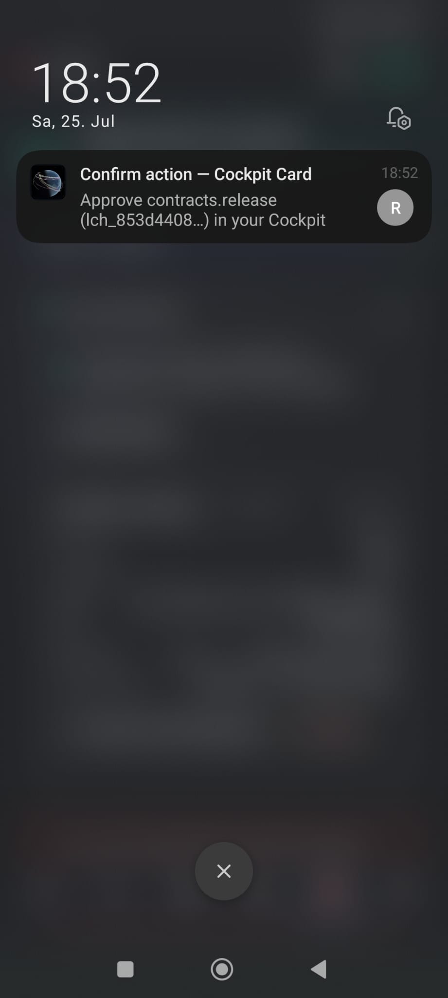An Android lock screen at 18:52 showing one notification titled 'Confirm action — Cockpit Card' with the body 'Approve contracts.release (lch_853d4408…) in your Cockpit'.